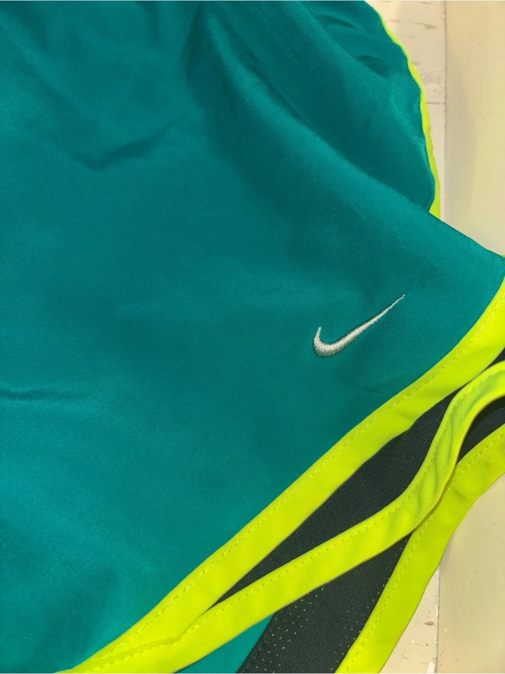Nike Teal Athletic Shorts with Neon Yellow Trim